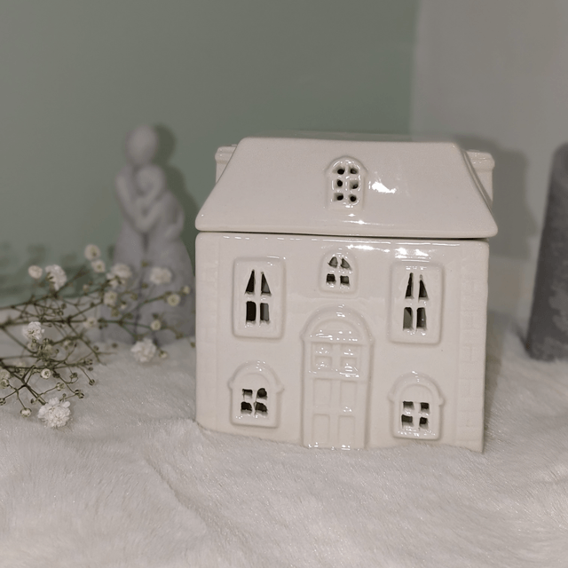 White ceramic house wax burner